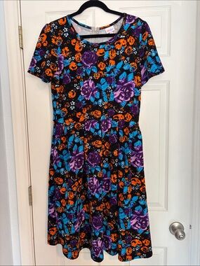LuLaRoe Amelia Black Midi Dress with Purple, Orange & Blue Floral Pattern.